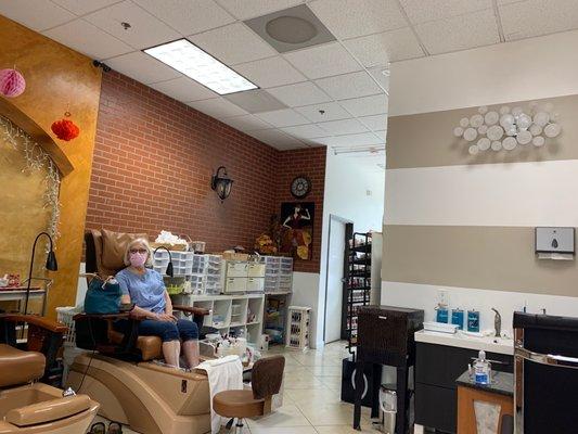 Pedicure chair. (That's my mom).