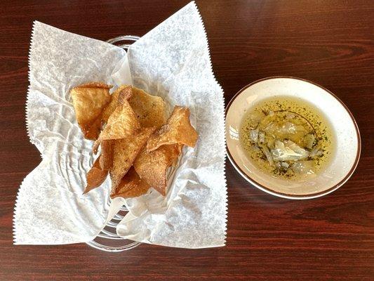 Complimentary Chips, Bread (Under the Chips) and Seasoned Olive Oil