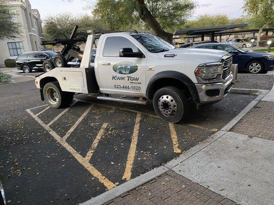 Eduardo from kwik tow using a handicap spot to tow legally parked cars. He made death threats when confronted.