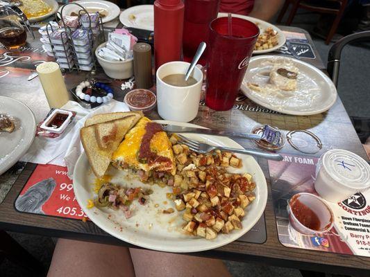 Western omelette. Biscuits and gravy. Hot coffee