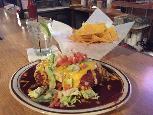 Had the Eddie's Burrito. Served with chicken, Spanish rice, sautéed jalepeno's, peppers and onions. Huge and just spicy enough.