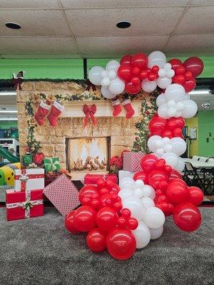 Balloon arch with backdrop.