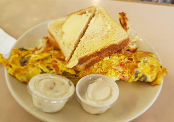 The gyro and feta omelette with tomato and onion added.