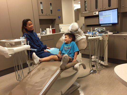 My 4-year old laughing with Maria the hygienist