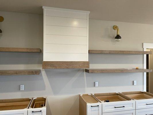 Custom stained and finished shelving and painted shiplap