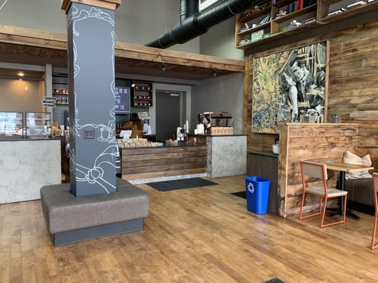 Counter area. Little pastry cases to the left, bottled bevs, counter to order with little snack packs