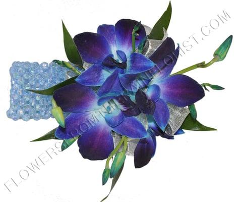 Beautiful blue orchids on a Keepsake bracelet. Perfect for weddings or Proms.