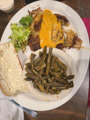 Crab cake stuffed flounder, green beans, bread.