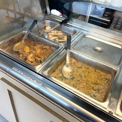 Beef curry and mungo beans in front, fish in back