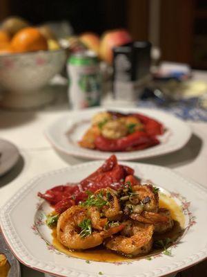 Seared prawns with caramelized tomato cilantro reduction.