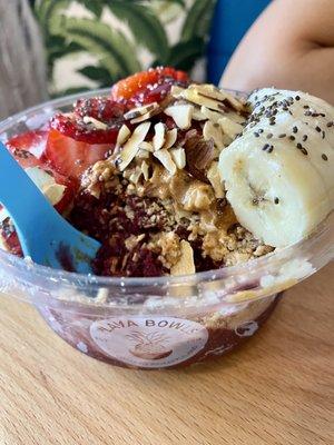 Pacific bowl with half açaí/green and added scoop of almond butter. A must try!