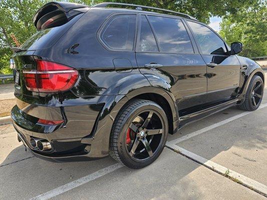 2013 BMW X5 35i with Hamann wide body kin installed.