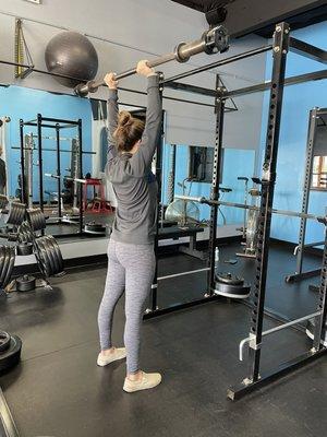 Client demonstrating the OverHead Press