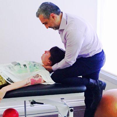 Dr. Payam Hakimi performing Osteopathic Manipulation of the rib cage and clavicle.  This technique is used for headaches, Neck pain...