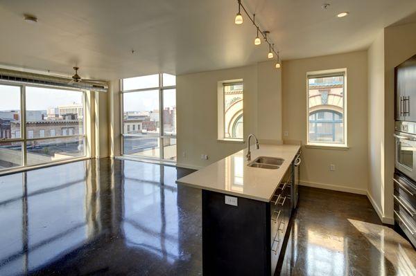 Here is an image of one our luxury 2 bedroom units including 2 bathrooms and beautiful views of the downtown Syracuse Area