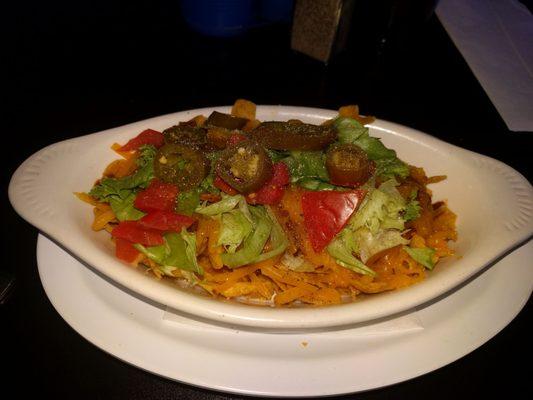 Frito Pie with lettuce, tomatoes and jalapenos - delicious! My husband had a Texas Two Step Burger and it was huge and delicious, too!