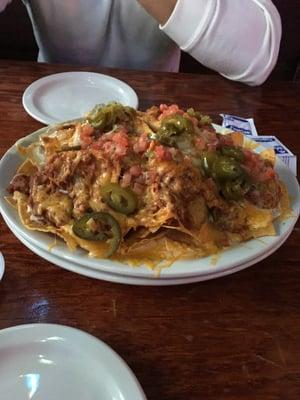 'Loaded nachos'.   Pretty disgusting, made with what I presume is canned beef.