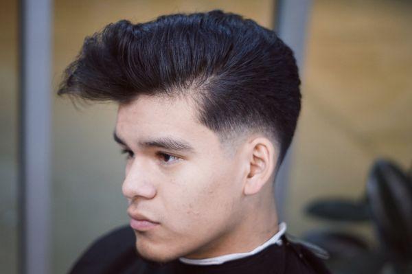 Pompadour with a low skin fade by Sean. Styled with just a blow dryer and no product.