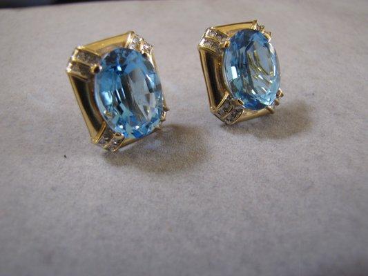 Blue Topaz, diamond and 14k yellow gold earrings.