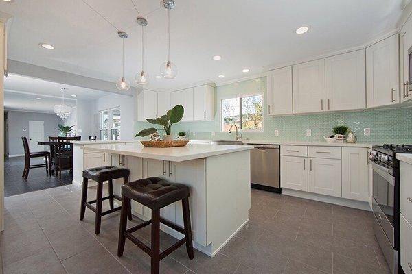 Amazing kitchen cabinet install from DJ Home Plus! Ebony laminate flooring too! So happy with these guys!