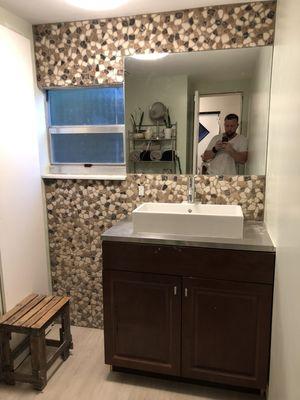 Stone wall and mirror install