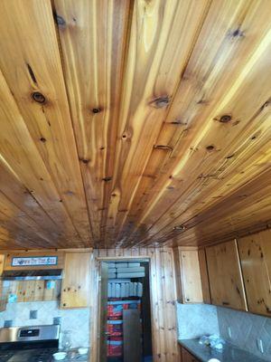 Installation of knotty cedar tongue and groove ceiling