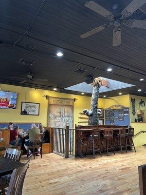 Upstairs dining area with the hanging gator