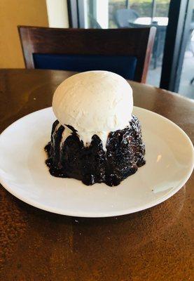 Our molten chocolate cake topped with homemade vanilla ice cream