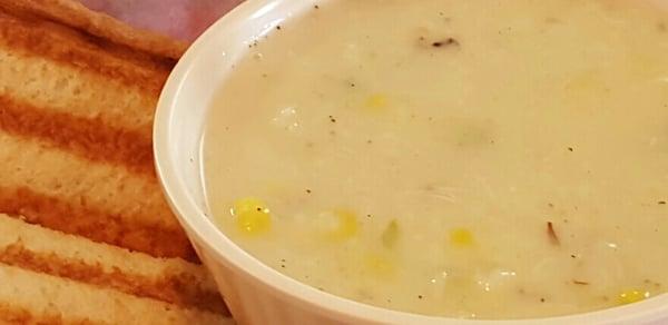 Crab bisque, corn chowder soup... you can see the corn!