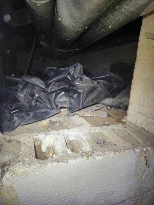 Improperly installed crawl space sheeting