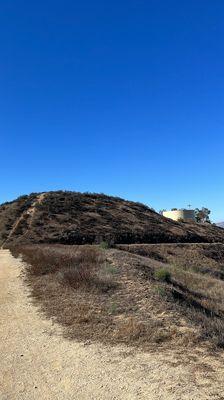 Lots of different paths up the hills , you can access the top of the hills via the community college parking lot through the school.