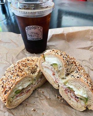 Desi Sandwich on an Everything Bagel with a Cold Brew