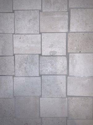 Shower floor - uneven grout lines