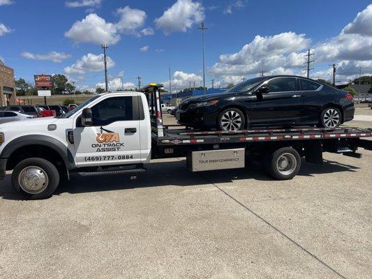 Ontrack Assist Towing a Honda on a sunny day