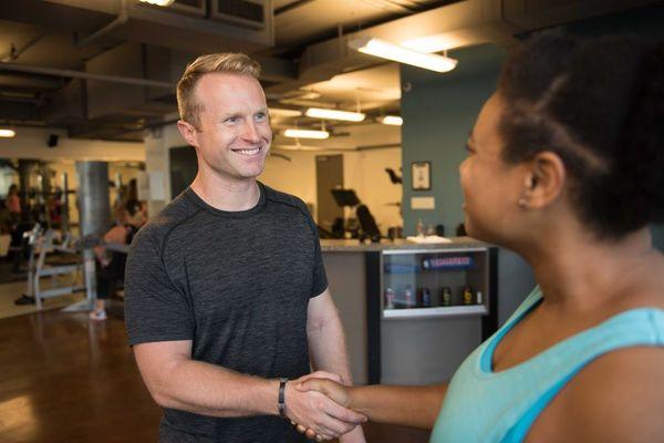 Robbie greeting a client before their first session