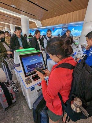 Delta self check-in kiosks inside LAX Terminal 3.