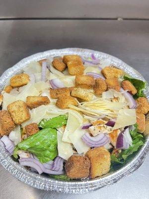 Grilled chicken Caesar salad/ customer wanted onions