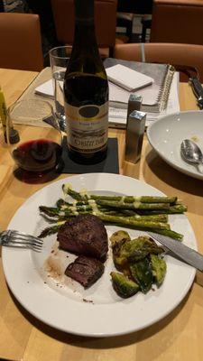 5oz filet, asparagus, brussel sprouts, bottle of Pinot noir. Phone did not eat first.