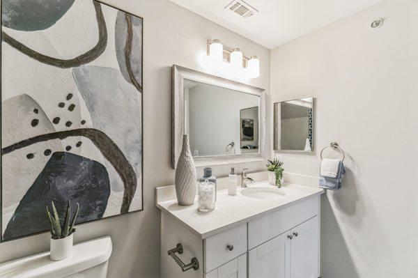 Newly renovated well lit bathroom at The Oakley at Saraland in Saraland, AL.