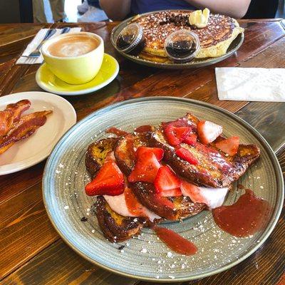 Strawberries and cream French toast, bacon, chocolate chip pancakes