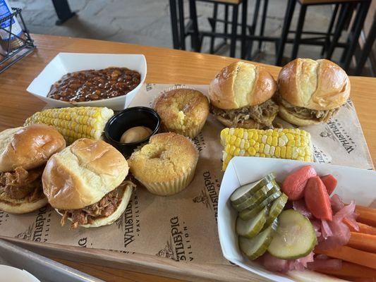 Sampler... pulled pork (my favorite) and shredded chicken sliders, pickled veggies, corn muffin, corn on the cob. Perfect for 2