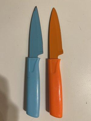 Knife (blue) was ground into a different shape instead of just sharpened. (Orange, same model, for comparison.)