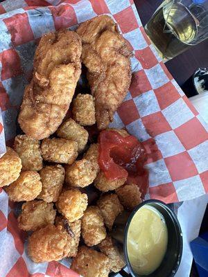 Today was $1.00 chicken tender night ! Delicious tenders with spicy garlic sauce on the side ! Plus crispy tater tots .