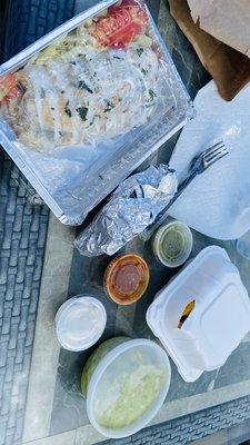 Take out packaging- food arrived warm and good call on the vent for the tostones.  Forgot the combo soda though.