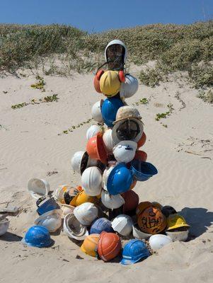 Hard hat tree...I was surprised at the lack of trash, plastic etc washed up this day