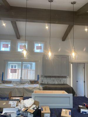 Pendant lights over a kitchen island