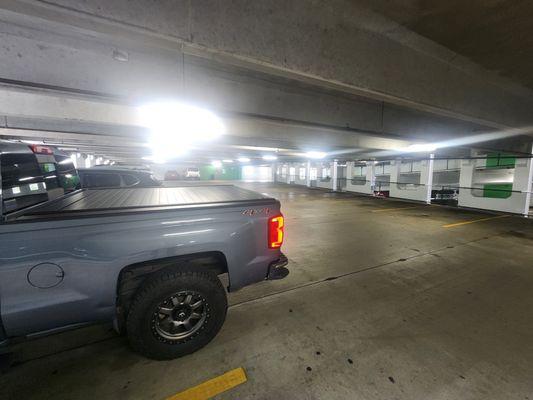 $90 ticket for tires touching yellow line in an empty garage.