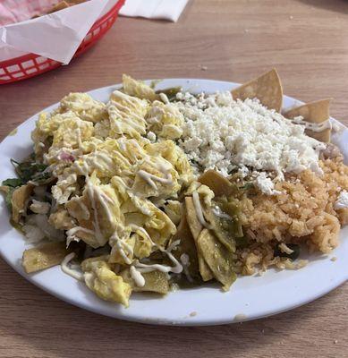 Chilaquiles Verdes with queso fresco & crema Centro-Americana we brought since they don't use them here.