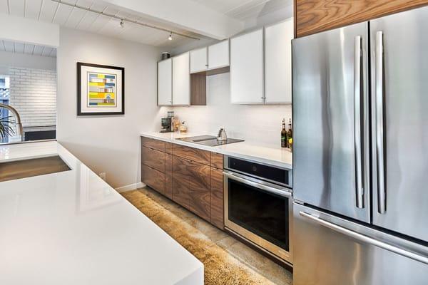 Full kitchen remodel for this Eichler in Willow Glen. We designed, built, and installed the kitchen and bathroom vanity for this customer.