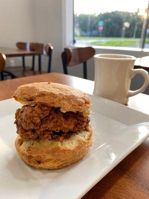 Fried buttermilk chicken on a maple bacon biscuit with cayenne maple syrup.